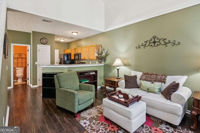 1714 Indian Way, Cumming, GA 30040 - living room featuring dark wood-type flooring and baseboards