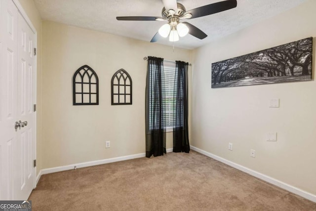 1714 Indian Way, Cumming, GA 30040 - carpeted empty room with a ceiling fan and baseboards