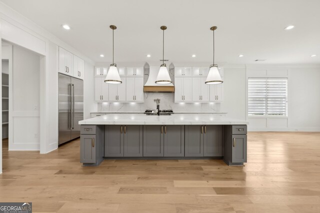 3735 Hamilton Mill Rd, Buford, GA 30519 - kitchen featuring built in fridge, premium range hood, white cabinetry, gray cabinets, and recessed lighting