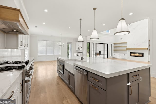 3735 Hamilton Mill Rd, Buford, GA 30519 - kitchen with stainless steel appliances, light wood-style flooring, recessed lighting, a spacious island, and decorative backsplash