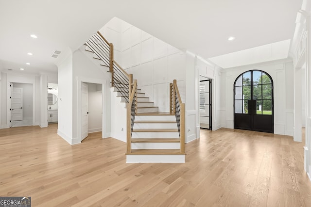3735 Hamilton Mill Rd, Buford, GA 30519 - entryway with stairs, light wood finished floors, french doors, and recessed lighting