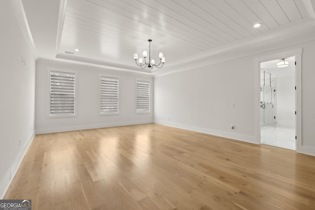 3735 Hamilton Mill Rd, Buford, GA 30519 - unfurnished room with light wood-style flooring, a chandelier, ornamental molding, a raised ceiling, and recessed lighting