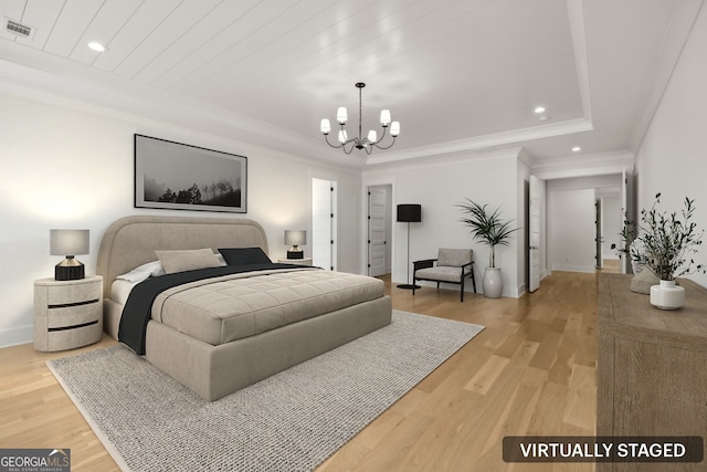 3735 Hamilton Mill Rd, Buford, GA 30519 - bedroom featuring a chandelier, recessed lighting, light wood-style flooring, a raised ceiling, and crown molding