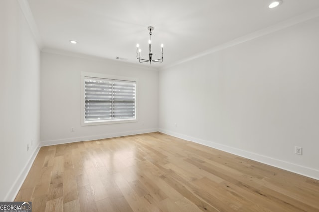 3735 Hamilton Mill Rd, Buford, GA 30519 - spare room featuring a chandelier, ornamental molding, light wood finished floors, and recessed lighting