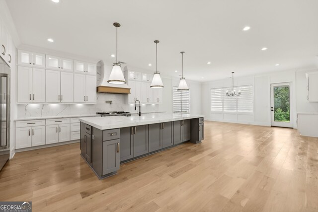 3735 Hamilton Mill Rd, Buford, GA 30519 - kitchen with custom exhaust hood, a chandelier, gray cabinetry, white cabinetry, and recessed lighting