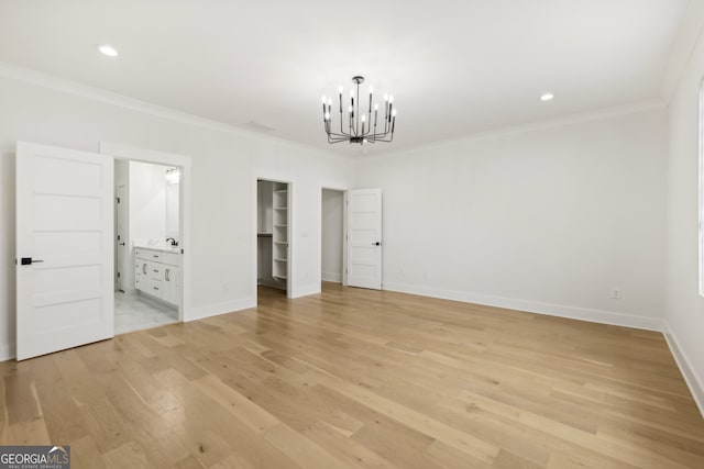 3735 Hamilton Mill Rd, Buford, GA 30519 - unfurnished room featuring a chandelier, crown molding, light wood finished floors, and recessed lighting