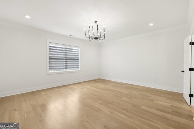 3735 Hamilton Mill Rd, Buford, GA 30519 - empty room with a chandelier, ornamental molding, light wood-style flooring, and recessed lighting