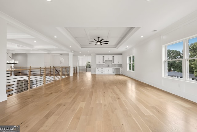 3735 Hamilton Mill Rd, Buford, GA 30519 - unfurnished living room with light wood finished floors, recessed lighting, decorative columns, and ceiling fan
