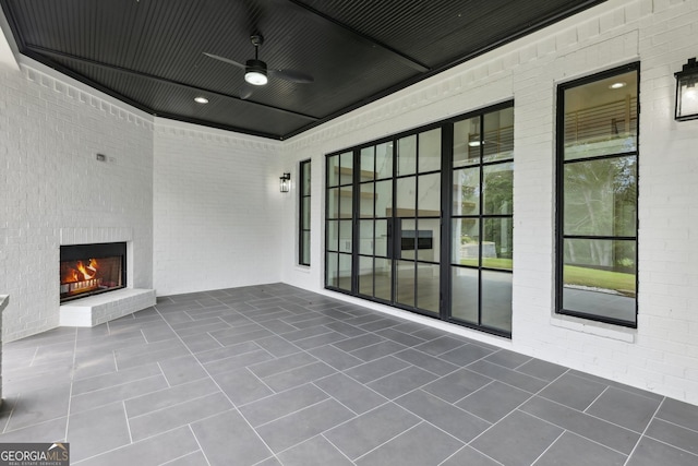 3735 Hamilton Mill Rd, Buford, GA 30519 - view of patio / terrace featuring an outdoor brick fireplace and a ceiling fan