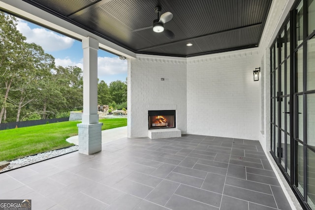 3735 Hamilton Mill Rd, Buford, GA 30519 - view of patio with an outdoor brick fireplace and ceiling fan