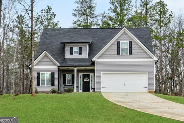 2046 Westbrook Rd, Commerce, GA 30530 - view of front of house featuring concrete driveway, an attached garage, a front yard, and a porch