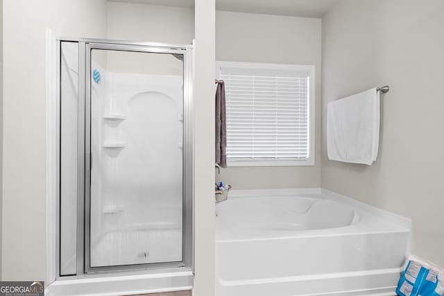 2046 Westbrook Rd, Commerce, GA 30530 - full bath featuring a shower stall and a garden tub