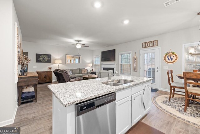 2046 Westbrook Rd, Commerce, GA 30530 - kitchen featuring dishwasher, a ceiling fan, light wood finished floors, white cabinets, and recessed lighting