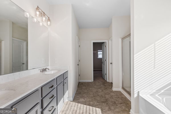 1494 Weeping Tree Cir, Hoschton, GA 30548 - bathroom featuring double vanity, a bath, and an enclosed shower