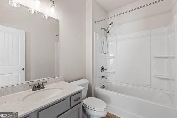 1494 Weeping Tree Cir, Hoschton, GA 30548 - full bath with vanity and bathtub / shower combination