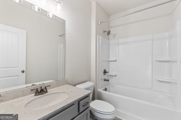 1494 Weeping Tree Cir, Hoschton, GA 30548 - full bath with vanity and washtub / shower combination
