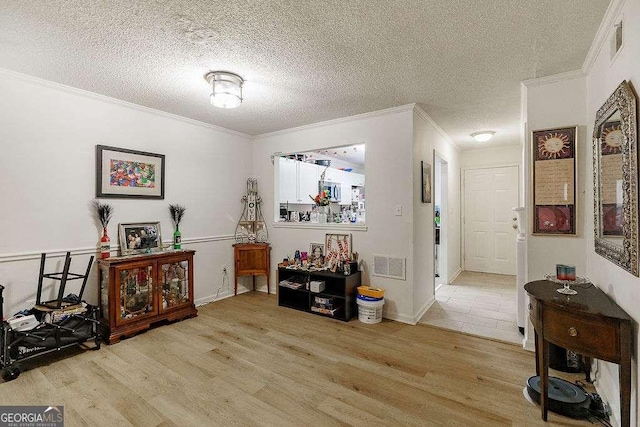 2505 Broad St W Unit 314, Athens, GA 30606 - interior space with crown molding, a textured ceiling, and wood finished floors