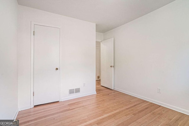1260 Fork Creek Trl, Decatur, GA 30033 - unfurnished bedroom with wood finished floors and baseboards