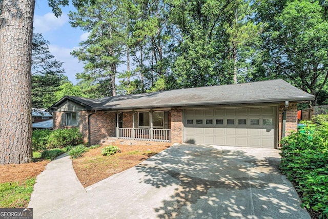1260 Fork Creek Trl, Decatur, GA 30033 - single story home with a porch, driveway, and brick siding