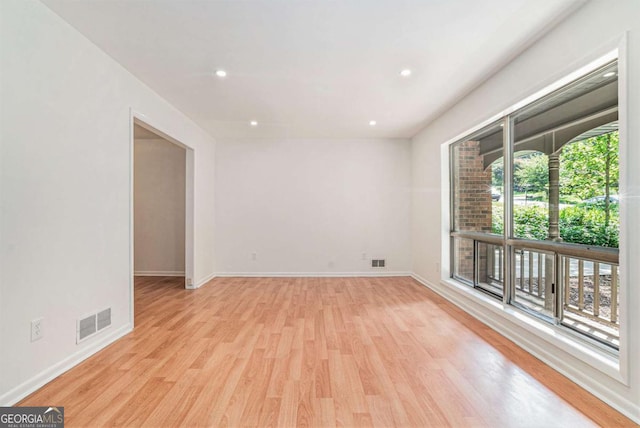 1260 Fork Creek Trl, Decatur, GA 30033 - unfurnished room with light wood finished floors and recessed lighting