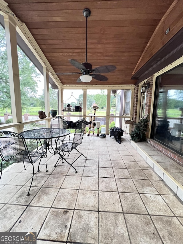 186 Kingston Rd, Colbert, GA 30628 - sunroom with ceiling fan, outdoor dining space, vaulted ceiling, and plenty of natural light