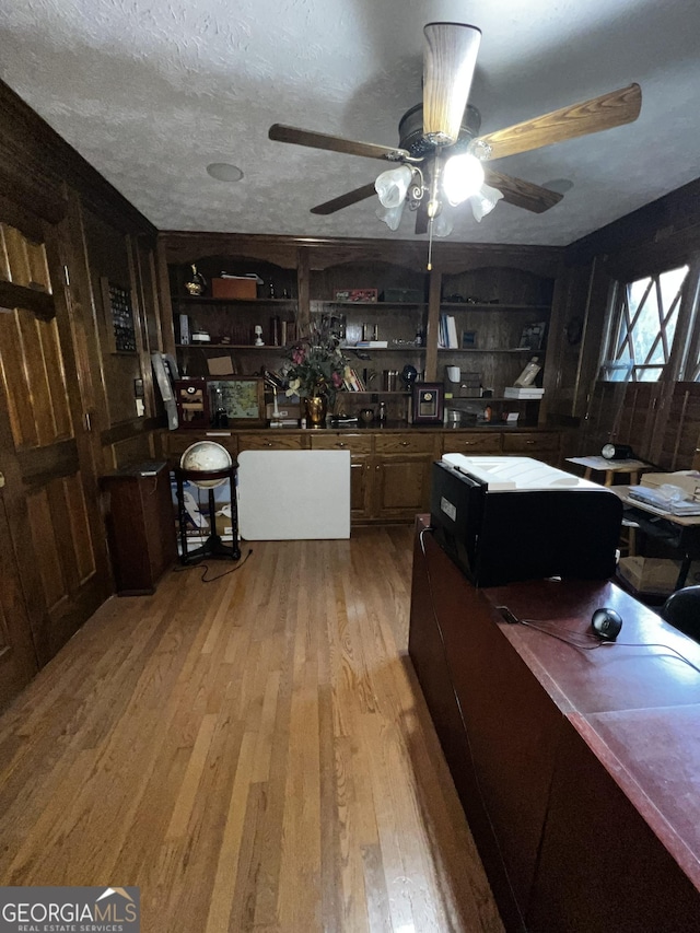186 Kingston Rd, Colbert, GA 30628 - kitchen featuring wood finished floors, open shelves, and ceiling fan