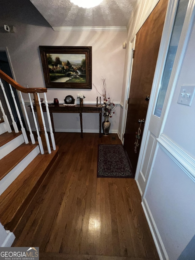 186 Kingston Rd, Colbert, GA 30628 - foyer with wood-type flooring, stairway, and a textured ceiling