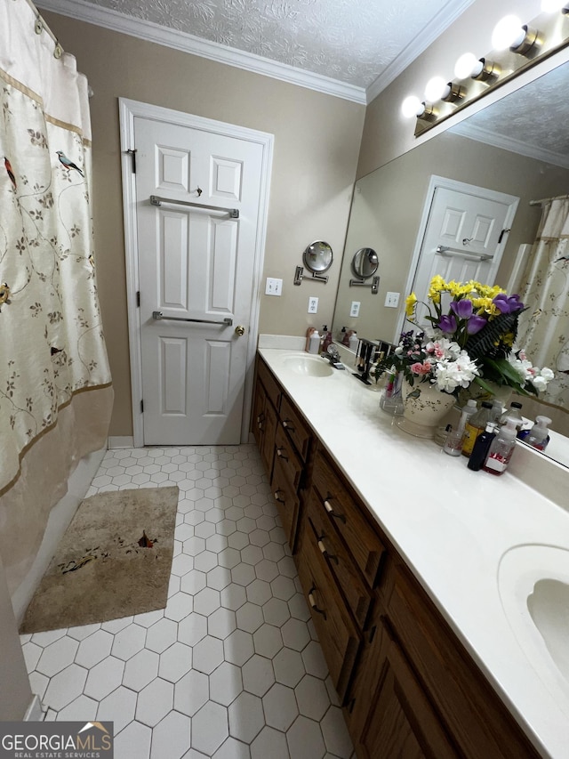 186 Kingston Rd, Colbert, GA 30628 - full bathroom with double vanity, tile patterned floors, and crown molding