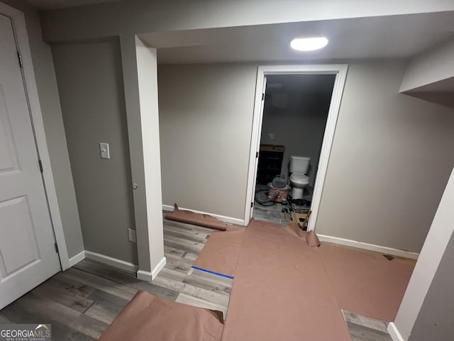 7128 Lady Heidi Ct, Jonesboro, GA 30236 - finished below grade area featuring wood finished floors and baseboards
