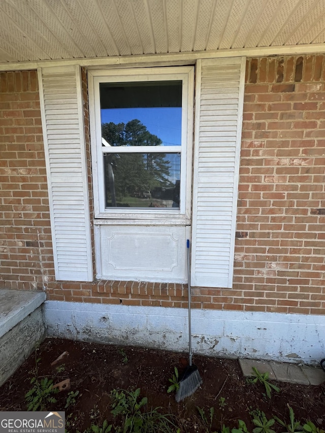 7128 Lady Heidi Ct, Jonesboro, GA 30236 - doorway to property with brick siding