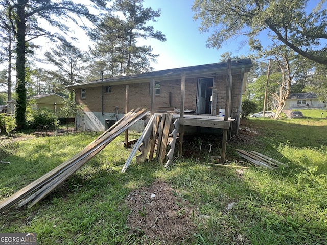 7128 Lady Heidi Ct, Jonesboro, GA 30236 - back of property featuring brick siding