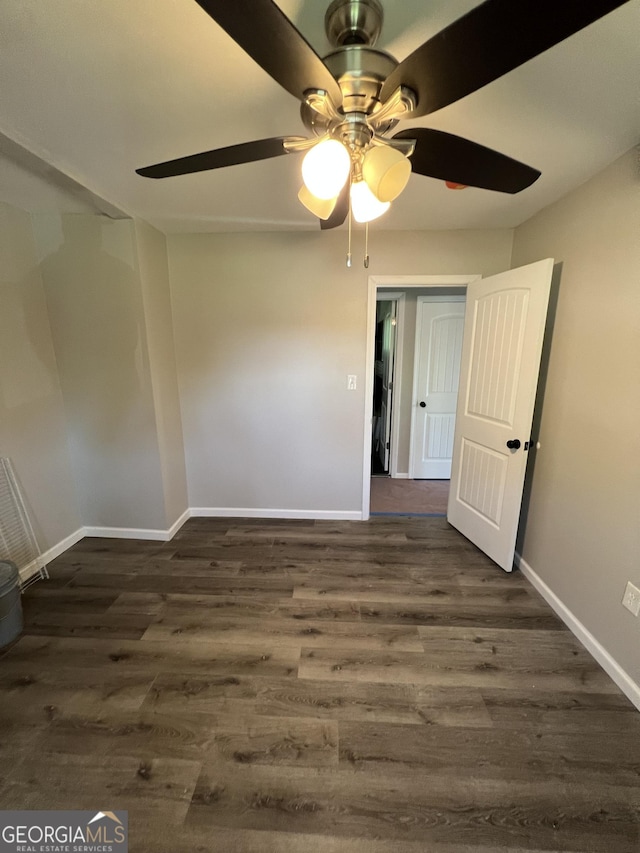 7128 Lady Heidi Ct, Jonesboro, GA 30236 - unfurnished room featuring ceiling fan and dark wood-type flooring