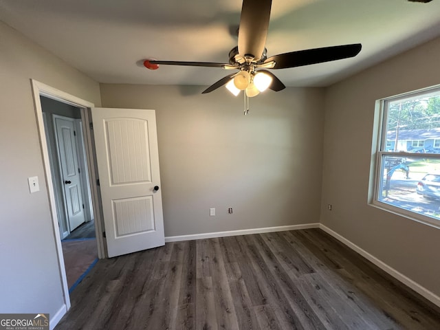 7128 Lady Heidi Ct, Jonesboro, GA 30236 - empty room with wood finished floors and ceiling fan