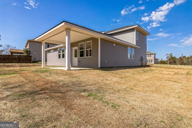 105 Ivy Glen Dr, Perry, GA 31069 - rear view of property with a patio area