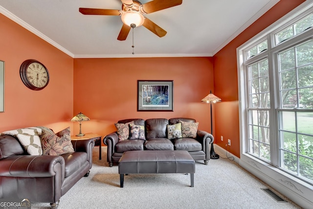 1640 Mount Mckinley Dr, Grayson, GA 30017 - living room featuring carpet flooring, healthy amount of natural light, crown molding, and a ceiling fan