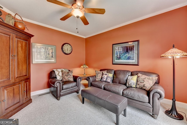 1640 Mount Mckinley Dr, Grayson, GA 30017 - living room with light carpet, ornamental molding, and a ceiling fan