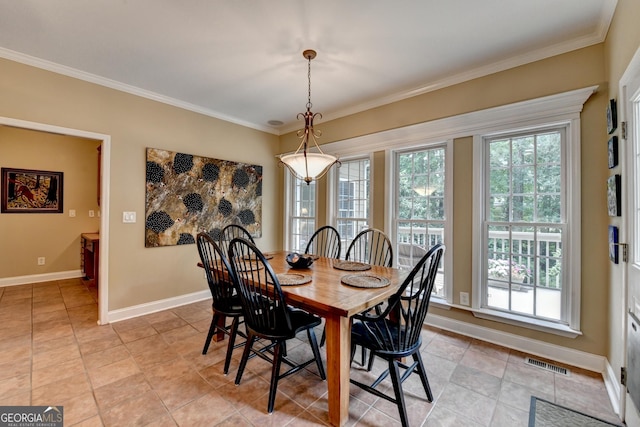 1640 Mount Mckinley Dr, Grayson, GA 30017 - dining space with ornamental molding and light tile patterned floors