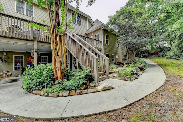 1640 Mount Mckinley Dr, Grayson, GA 30017 - back of house featuring stairs and a wooden deck