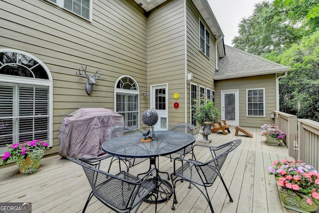 1640 Mount Mckinley Dr, Grayson, GA 30017 - wooden terrace with outdoor dining area