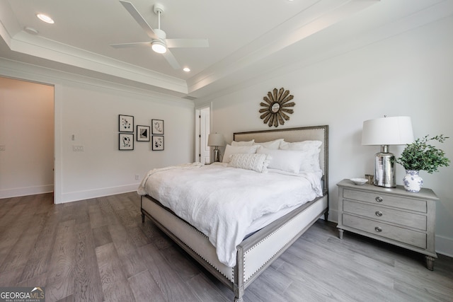 15755 Burdette Ct, Milton, GA 30004 - bedroom featuring a raised ceiling, wood finished floors, recessed lighting, ornamental molding, and a ceiling fan