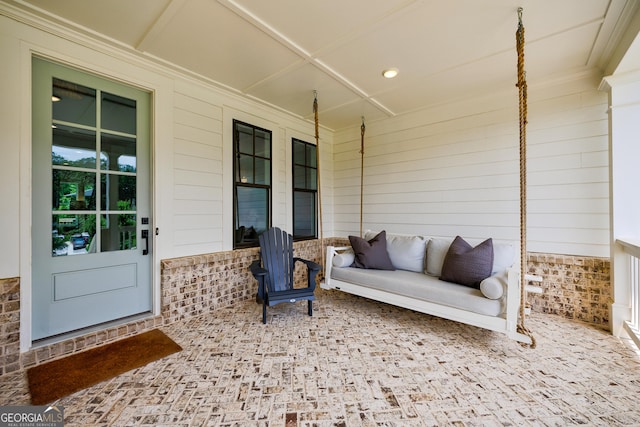 15755 Burdette Ct, Milton, GA 30004 - covered porch featuring an outdoor hangout area