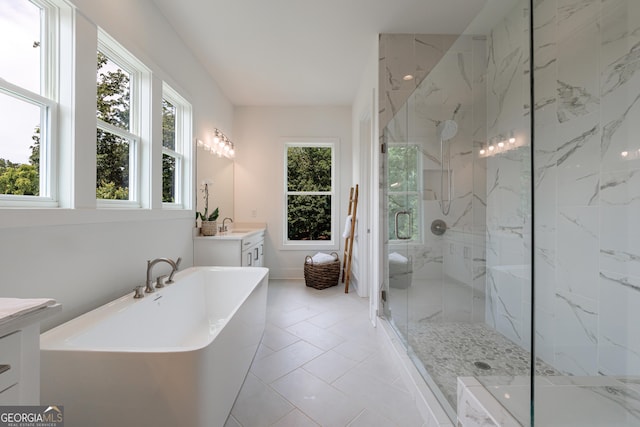 15755 Burdette Ct, Milton, GA 30004 - full bathroom featuring vanity, a freestanding bath, a marble finish shower, and tile patterned flooring
