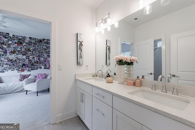 15755 Burdette Ct, Milton, GA 30004 - bathroom featuring double vanity and baseboards