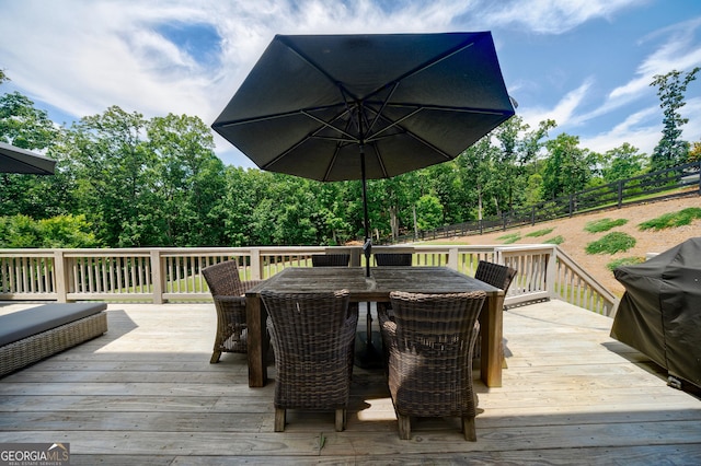 15755 Burdette Ct, Milton, GA 30004 - deck featuring a fenced backyard, outdoor dining space, grilling area, and view of scattered trees