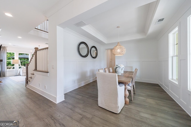 15755 Burdette Ct, Milton, GA 30004 - dining room with stairs, a decorative wall, crown molding, wood finished floors, and a chandelier