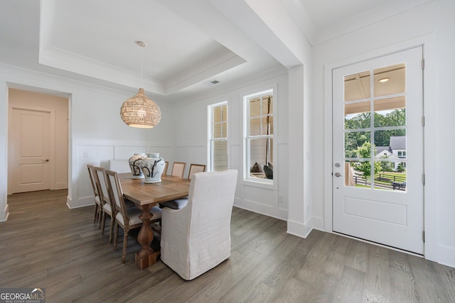 15755 Burdette Ct, Milton, GA 30004 - dining space featuring ornamental molding, a chandelier, wood finished floors, and a tray ceiling