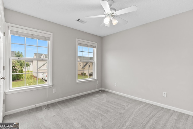 8750 Redford Ln, Suwanee, GA 30024 - empty room with carpet flooring and a ceiling fan