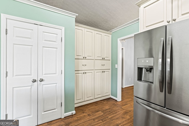 5832 Sycamore Ridge Dr, Sugar Hill, GA 30518 - kitchen with stainless steel refrigerator with ice dispenser, dark wood finished floors, a textured ceiling, and crown molding