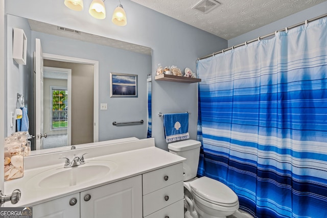 5832 Sycamore Ridge Dr, Sugar Hill, GA 30518 - bathroom with vanity, a textured ceiling, and curtained shower