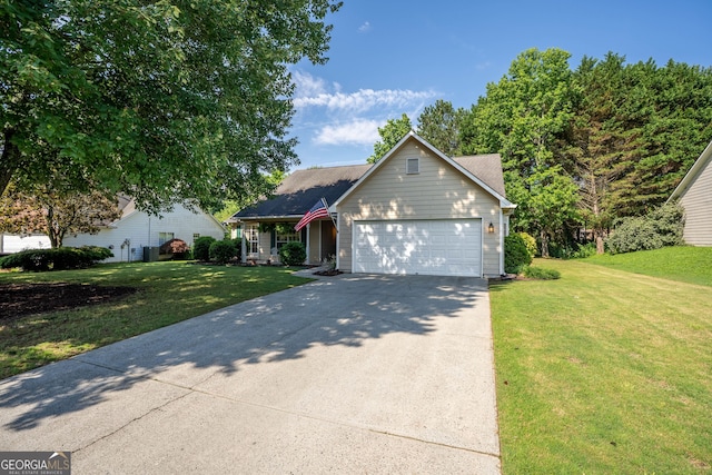5832 Sycamore Ridge Dr, Sugar Hill, GA 30518 - view of front of home with an attached garage, concrete driveway, a front yard, and a shingled roof